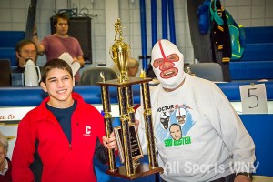 Hilton's Yianni Diakomihalis accepts DiPaolo MOW from Dick "The Destroyer" Beyer