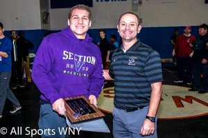 William Bolia of Fairport receives MOW Award from Coach John Scapelliti of Lockport.